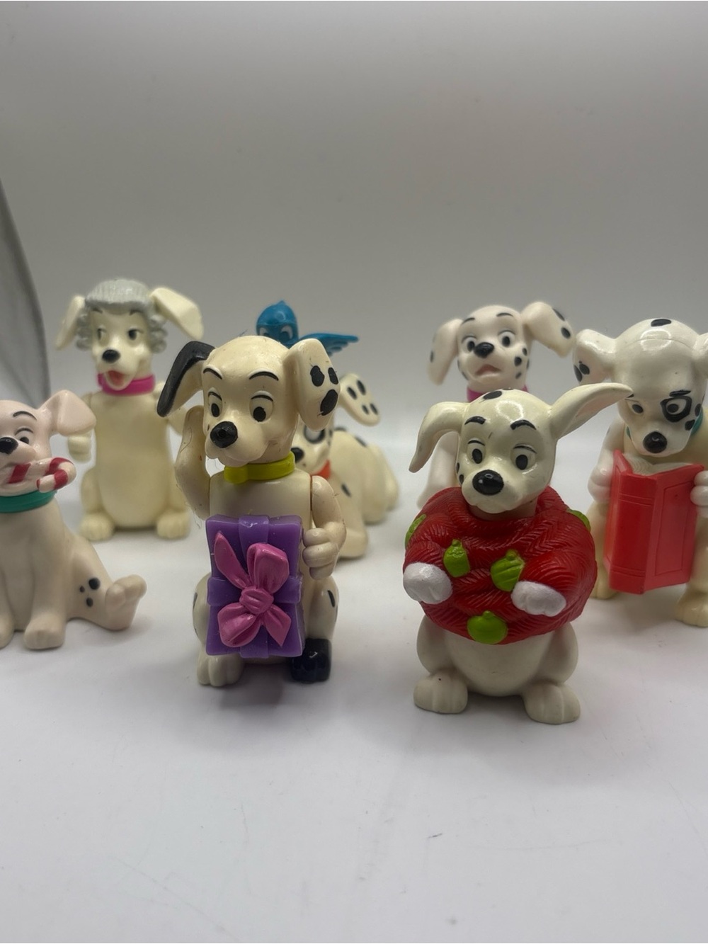 Disney White Dalmatian Holiday Dog Figurines with Red, Purple & Green Accents